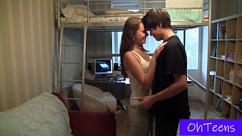 Sexy brunette Teen strips